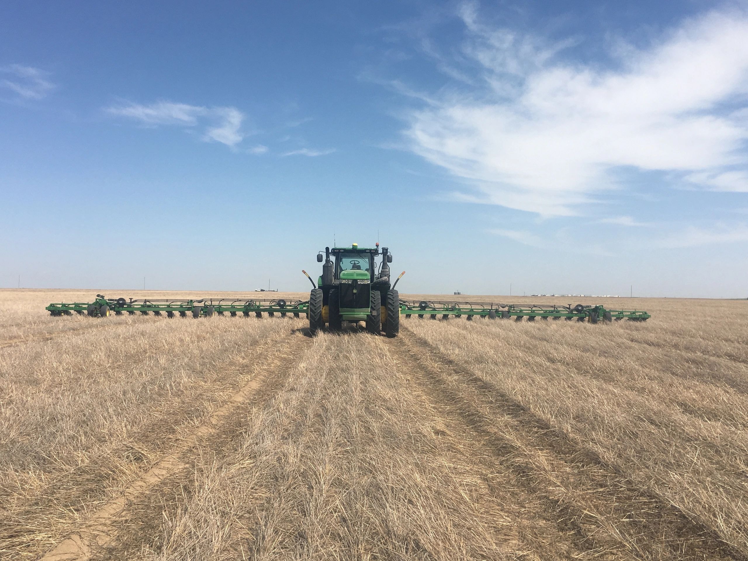 Southwest Family Farms tractor planting crops