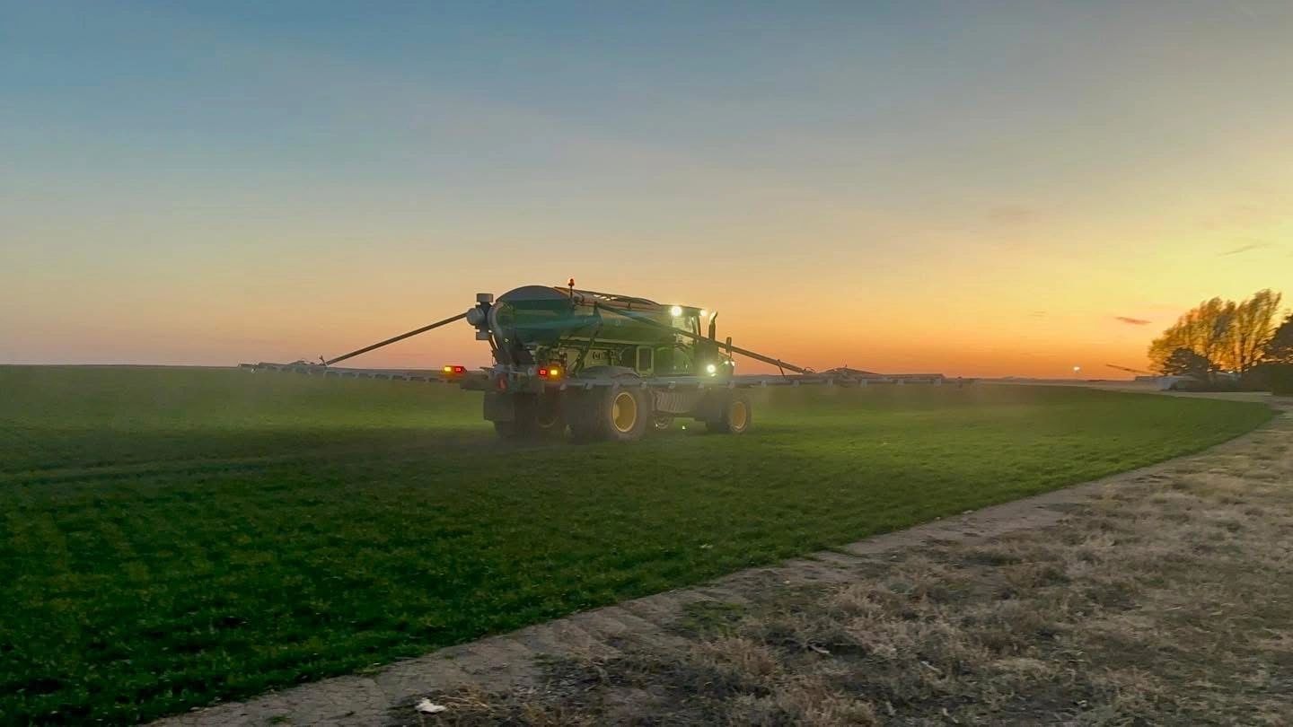 Tractor working in field